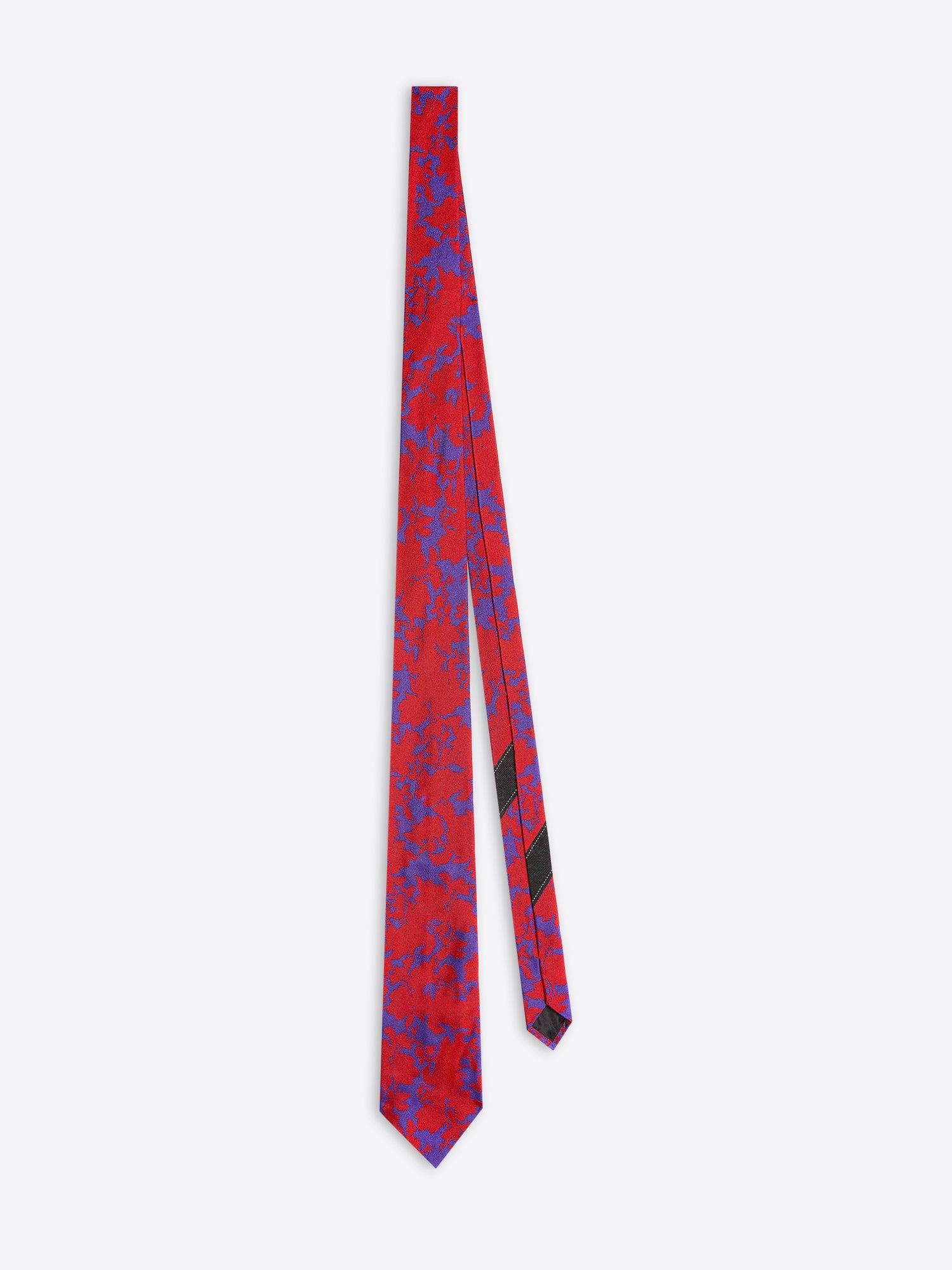 Red and blue patterned tie on a white background - Dries Van Noten