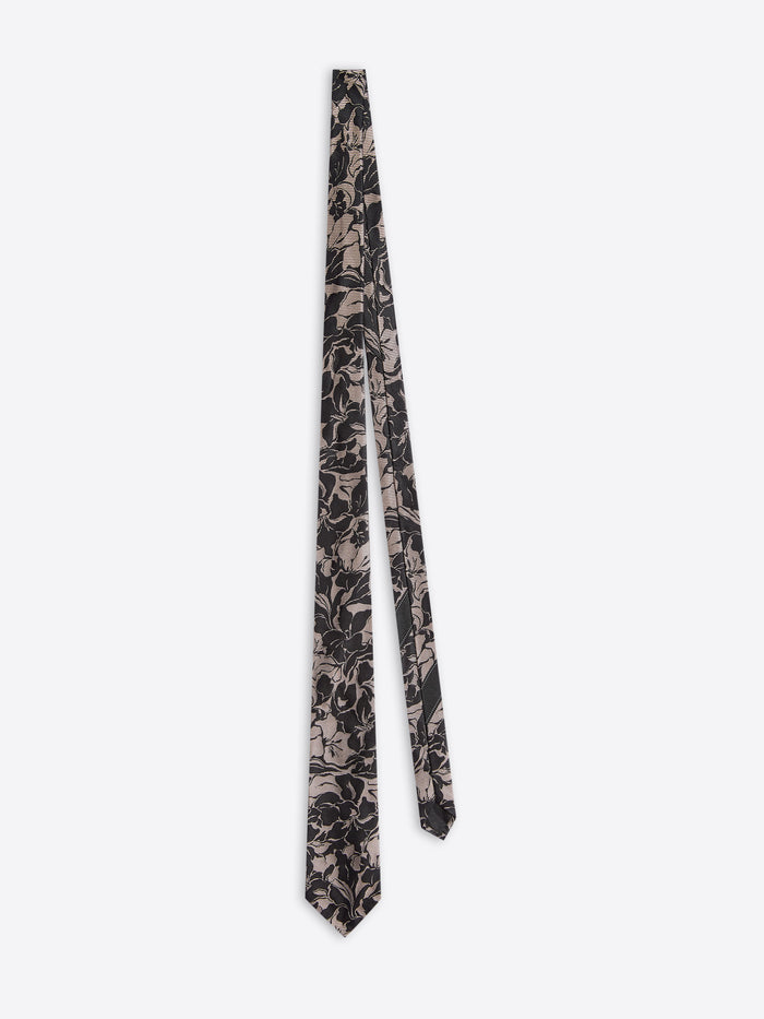 Floral patterned tie on a white background
