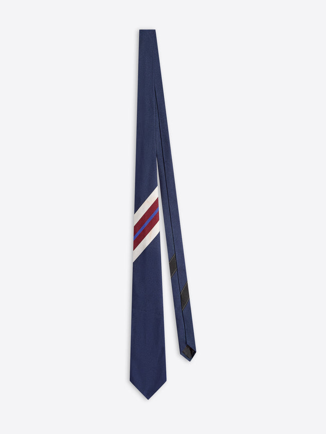 Navy blue tie with red and white stripes on a white background
