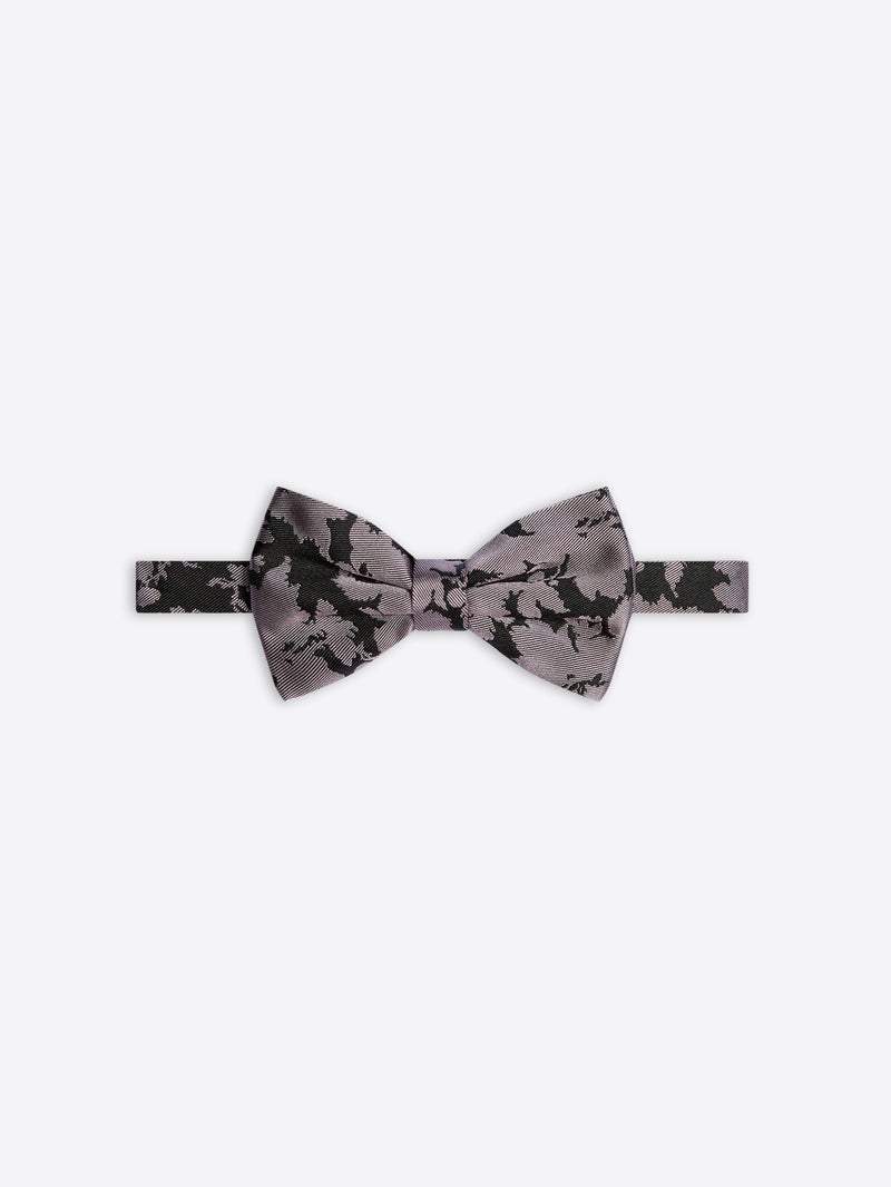 Gray bow tie with black floral pattern on a white background