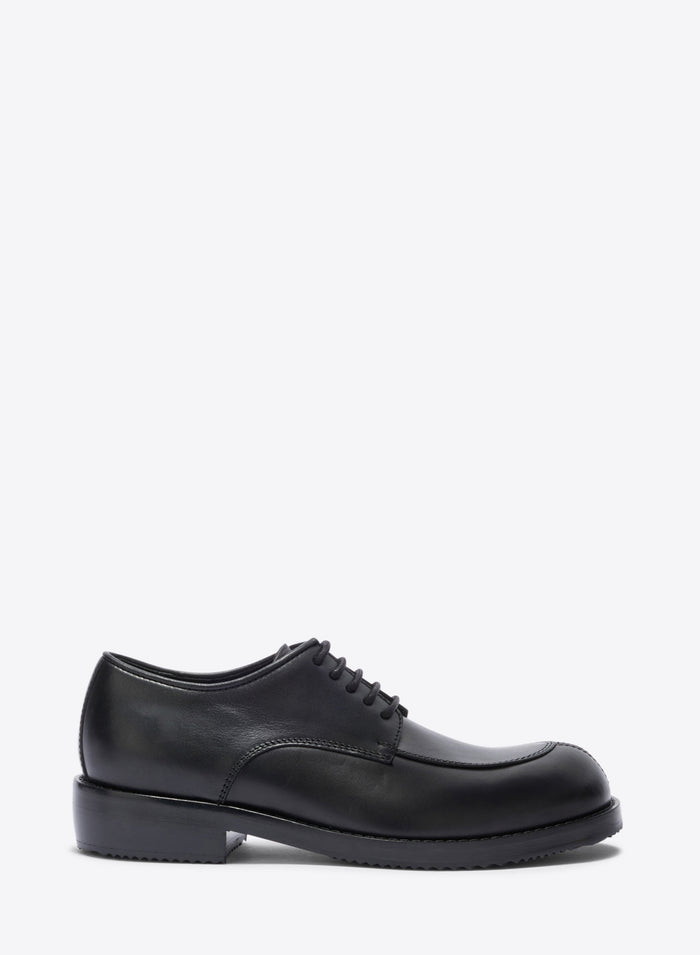 Black leather shoe on a white background - Dries Van Noten