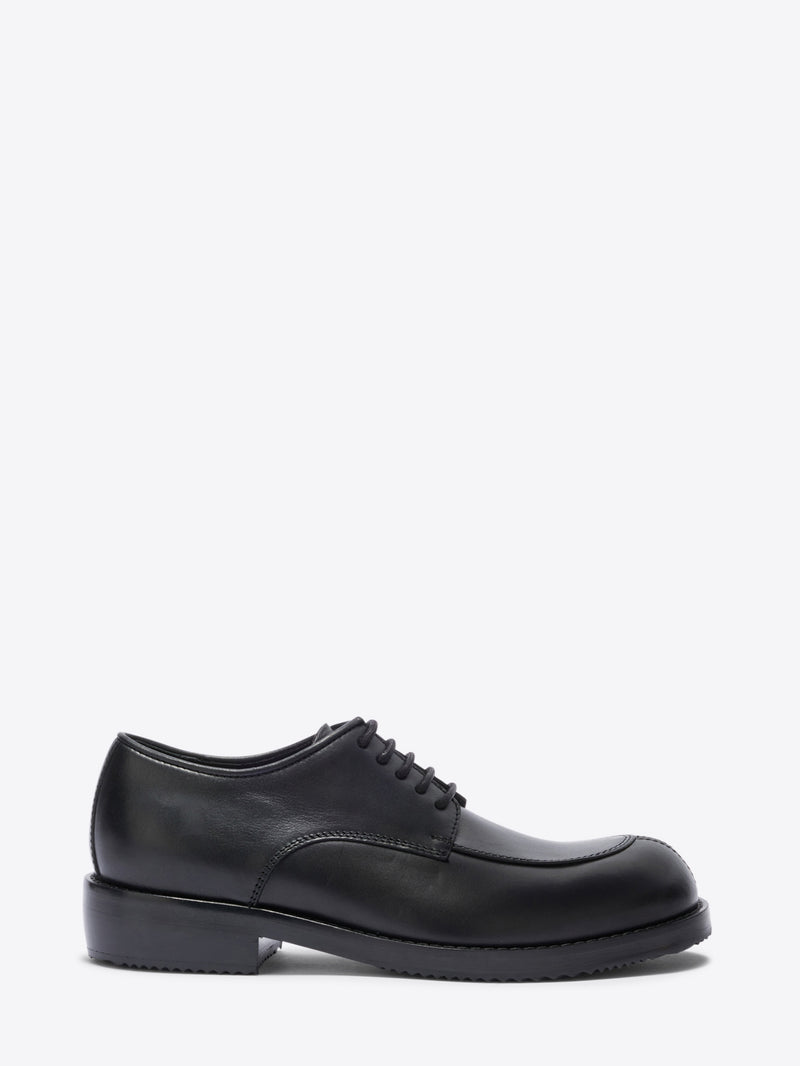 Black leather shoe on a white background - Dries Van Noten