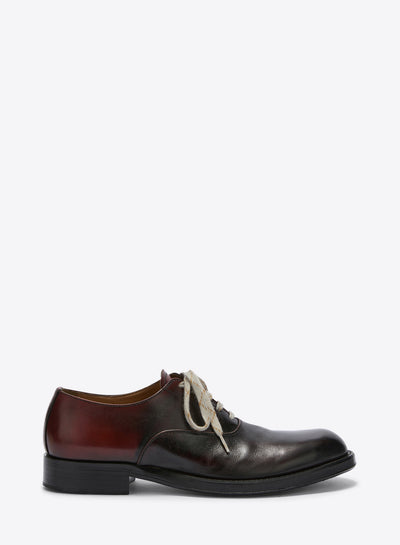 Brown leather shoe with white laces on a white background - Dries Van Noten