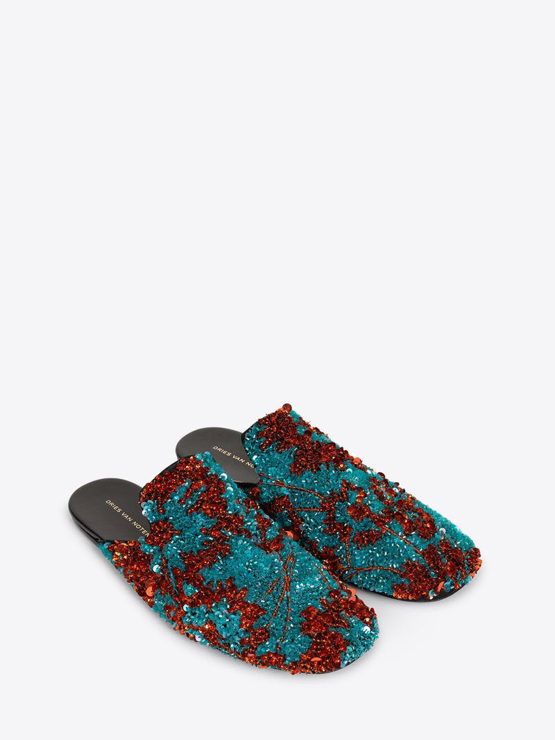 Turquoise and red slippers on a white background - Dries Van Noten