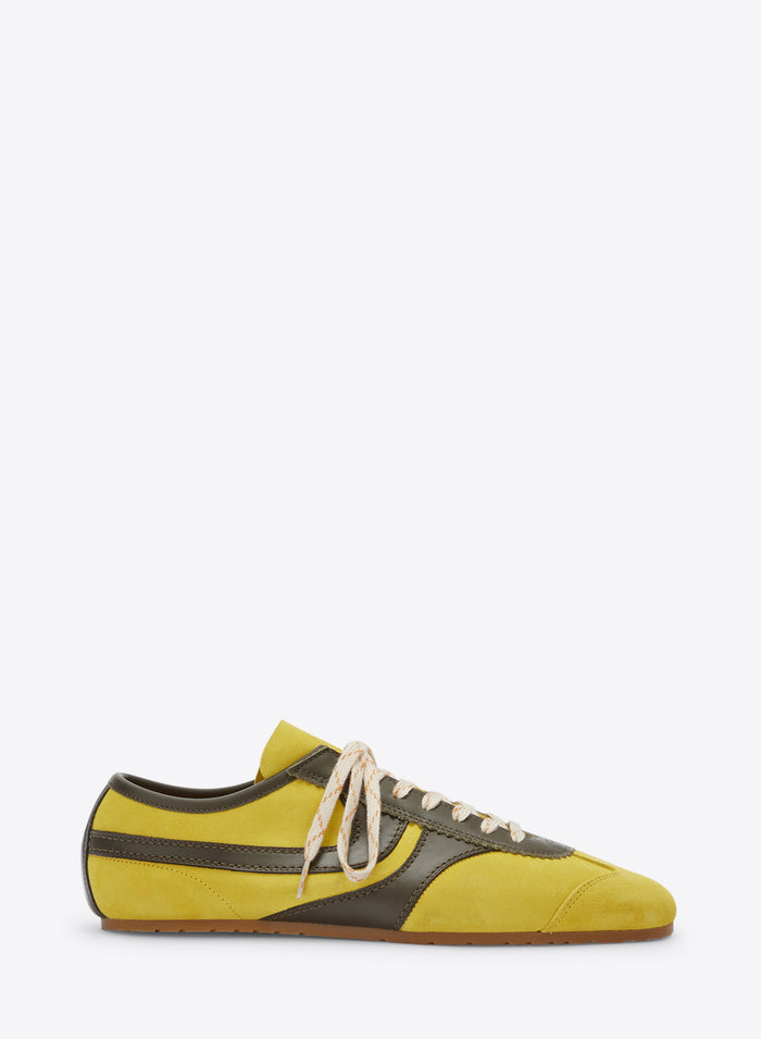 Yellow and black sneaker on a white background