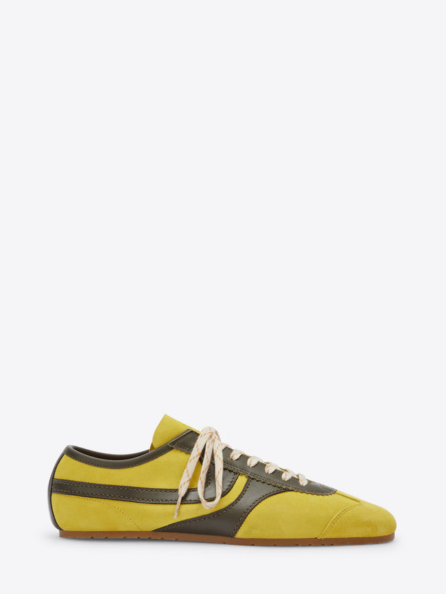 Yellow and black sneaker on a white background