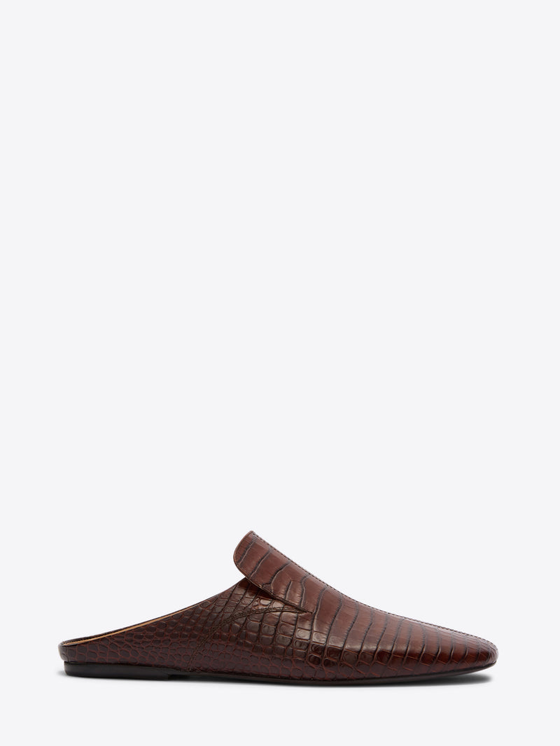 Brown slipper on a white background