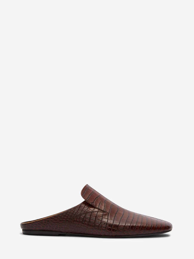 Brown slipper on a white background