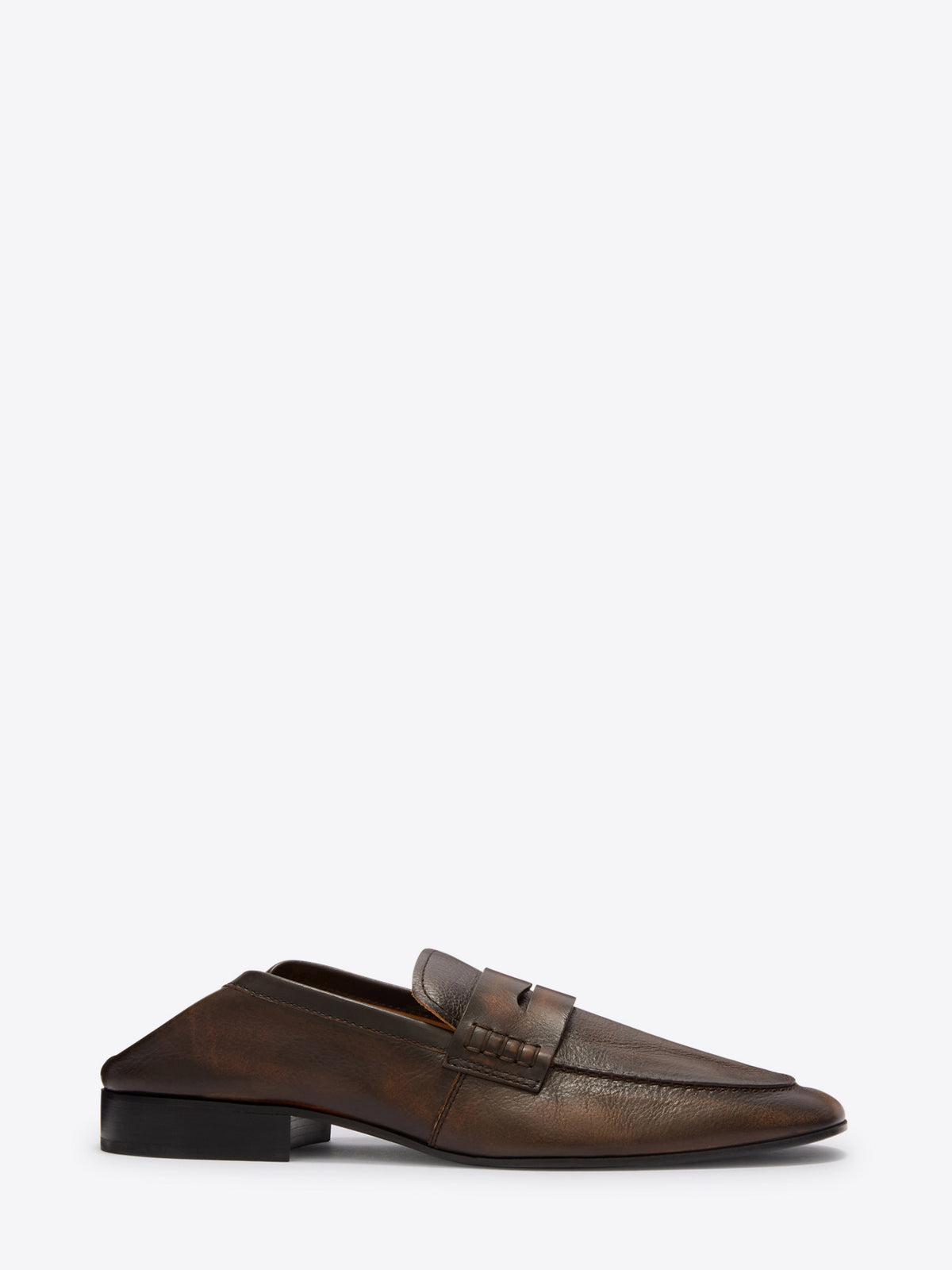 Brown leather loafer shoe on a white background