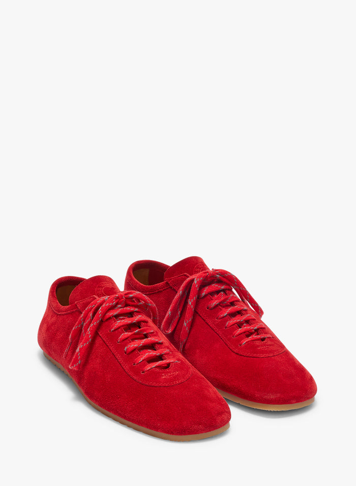 Red sneakers on a white background