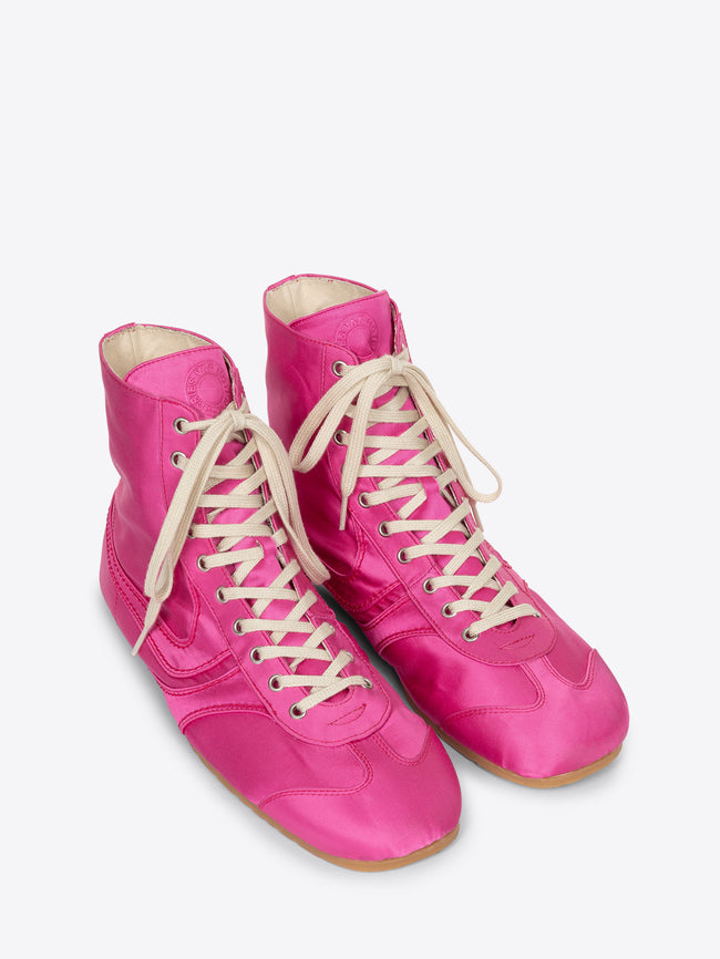 Pair of bright pink high-top sneakers with white laces on a white background - Dries Van Noten