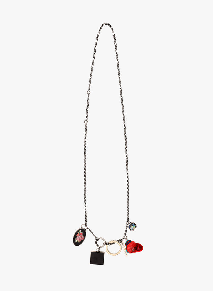 Necklace with various charms on a white background