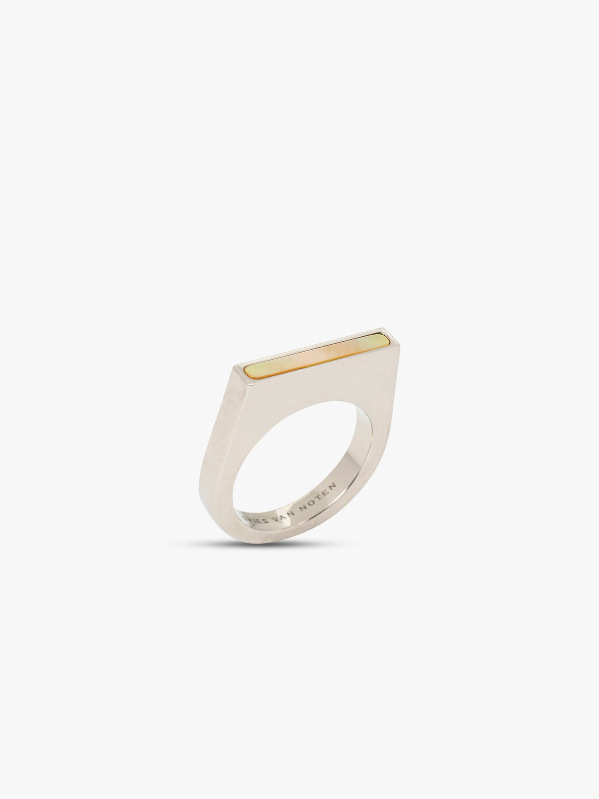 Silver ring with a gold accent on a white background