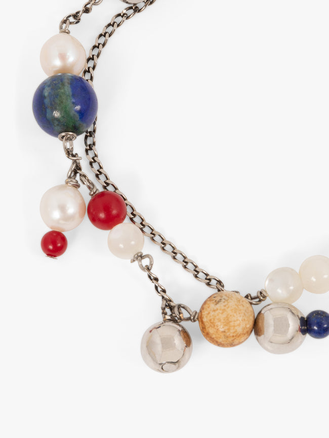 Multicolored beaded bracelet on a white background