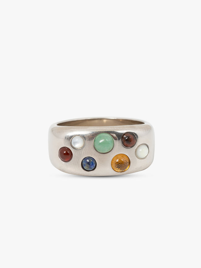 Silver ring with colorful gemstones on a white background