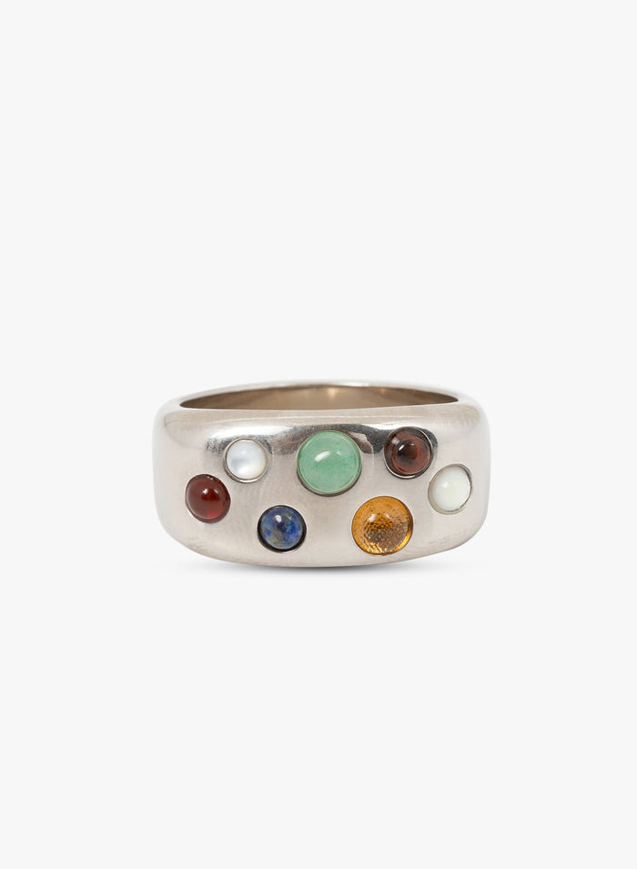 Silver ring with colorful gemstones on a white background
