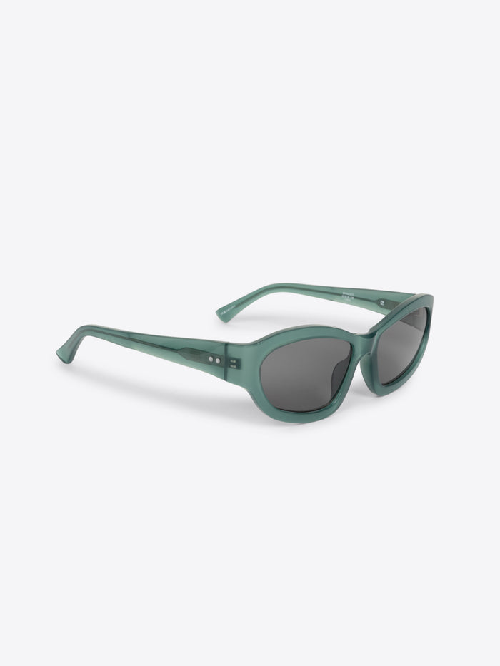 Green sunglasses on a white background