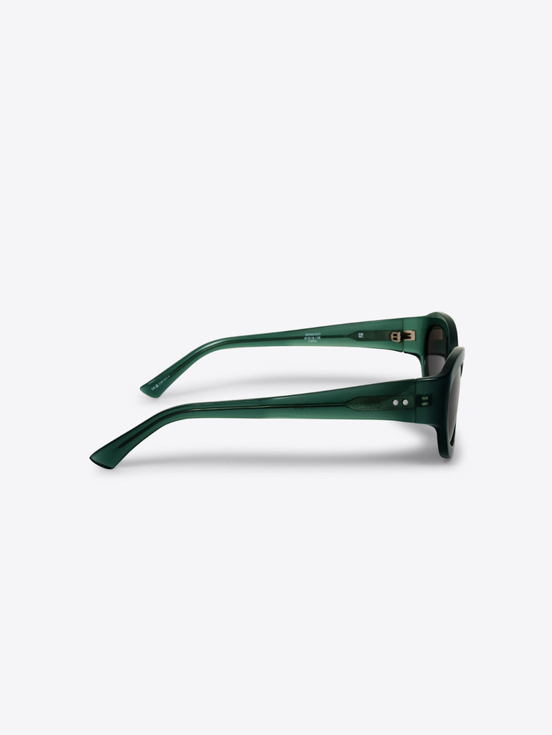 Green sunglasses on a white background