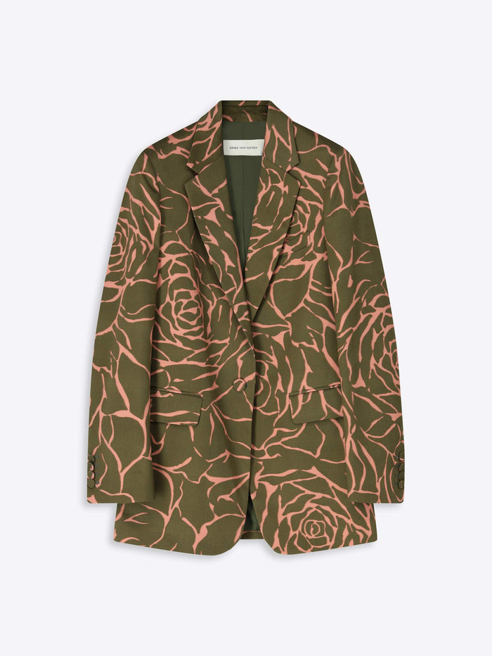 Green blazer with pink floral pattern on a white background