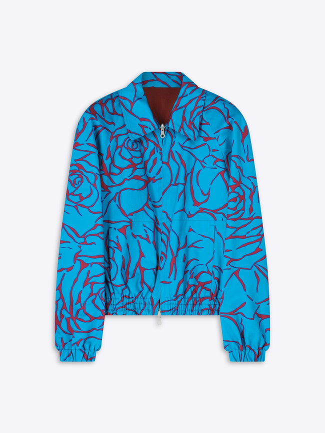 Blue jacket with red floral pattern on a white background