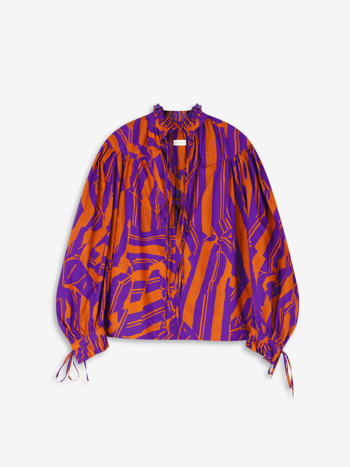Purple and orange patterned blouse on a white background