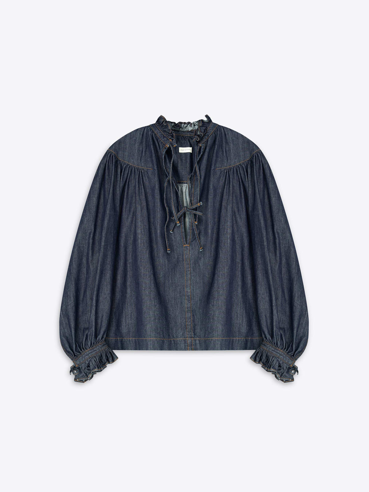 Denim blouse with ruffled sleeves on a light gray background