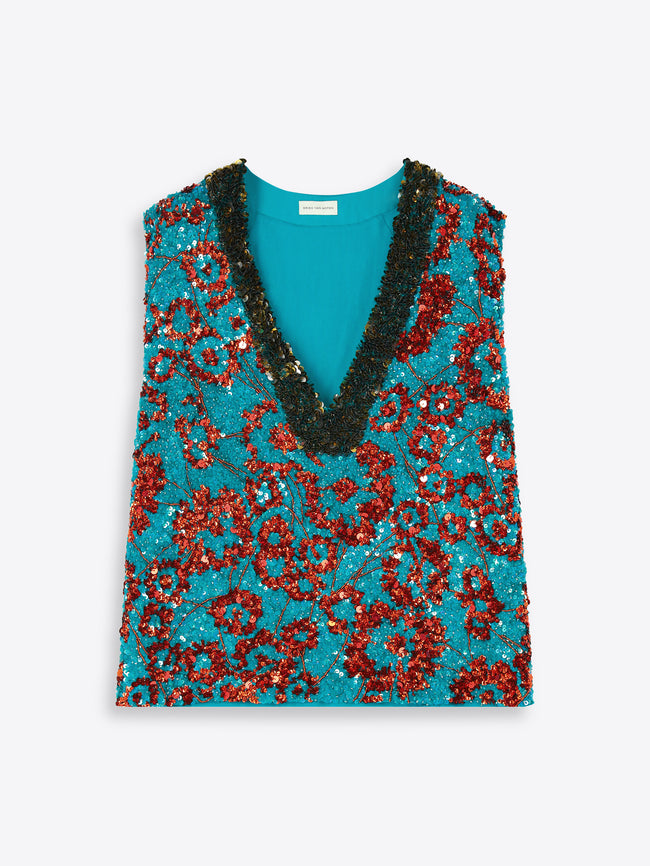 Turquoise top with red sequin vest on a white background