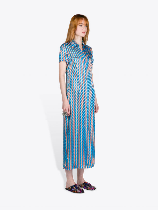 Woman wearing a blue patterned dress on a white background - Dries Van Noten
