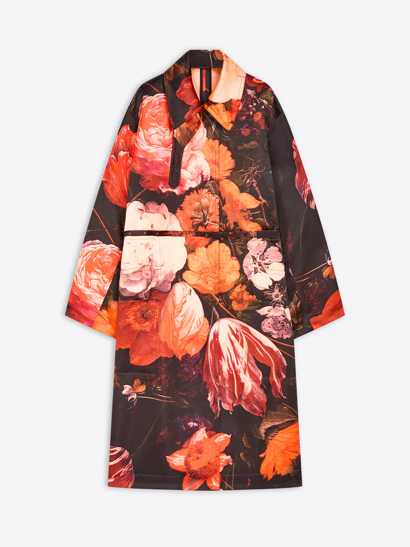 A long-sleeve collared coat with a bold floral print in shades of orange, red, pink, and white over a black background, displayed flat against a light gray background.