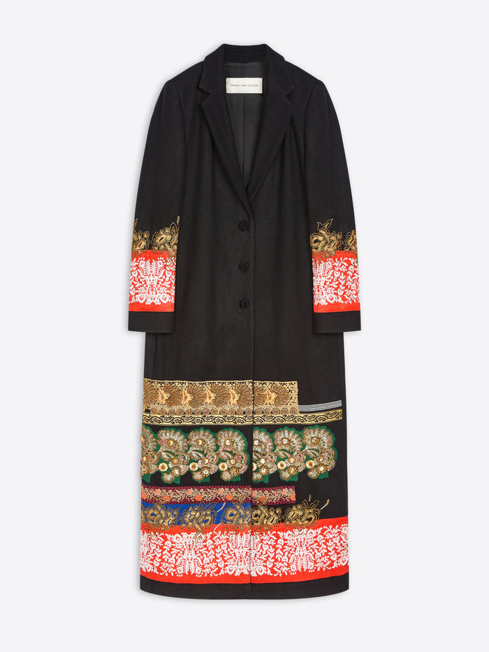 A black long coat with ornate multicolor embroidered and printed patterns concentrated at the cuffs and lower hem, shown flat against a light gray background.