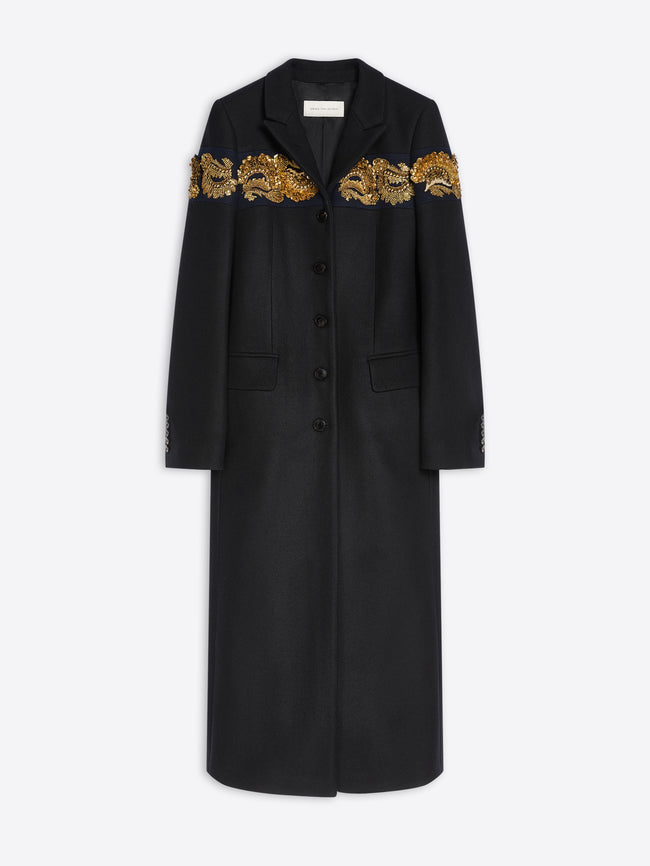 A long black coat with ornate gold embroidered detailing across the shoulders, shown against a light gray background.
