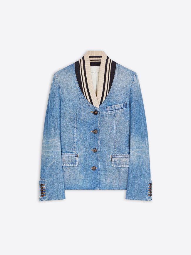 A light blue denim jacket with a striped black, white, and beige shawl collar, featuring front buttons and flap pockets, displayed on a gray background. 