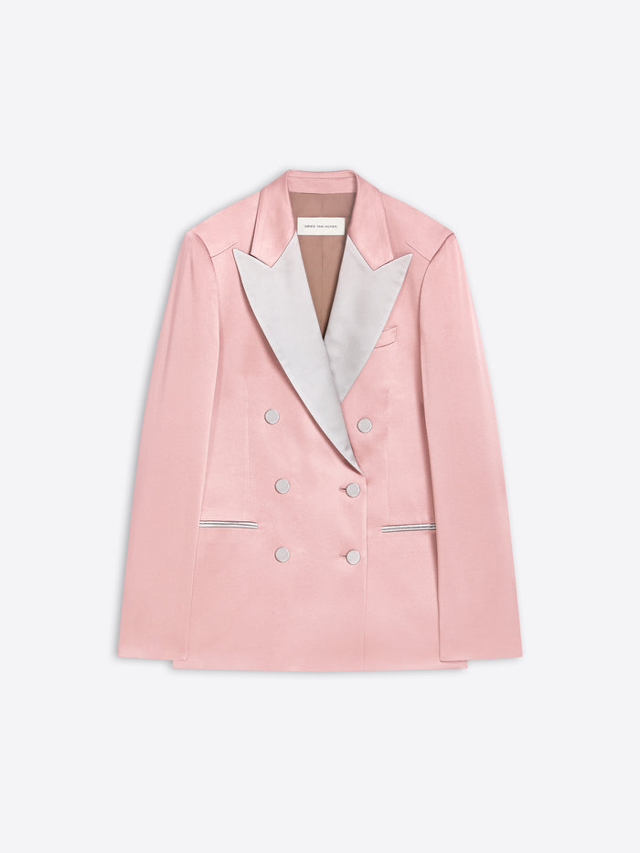 A light pink double-breasted blazer with contrasting shawl lapels and silver-tone buttons, displayed flat against a light gray background.