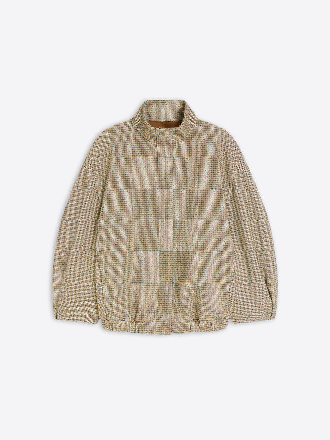 A textured, cropped knit jacket in a beige and brown tweed pattern, featuring a mock neck and long sleeves, shown against a light gray background.