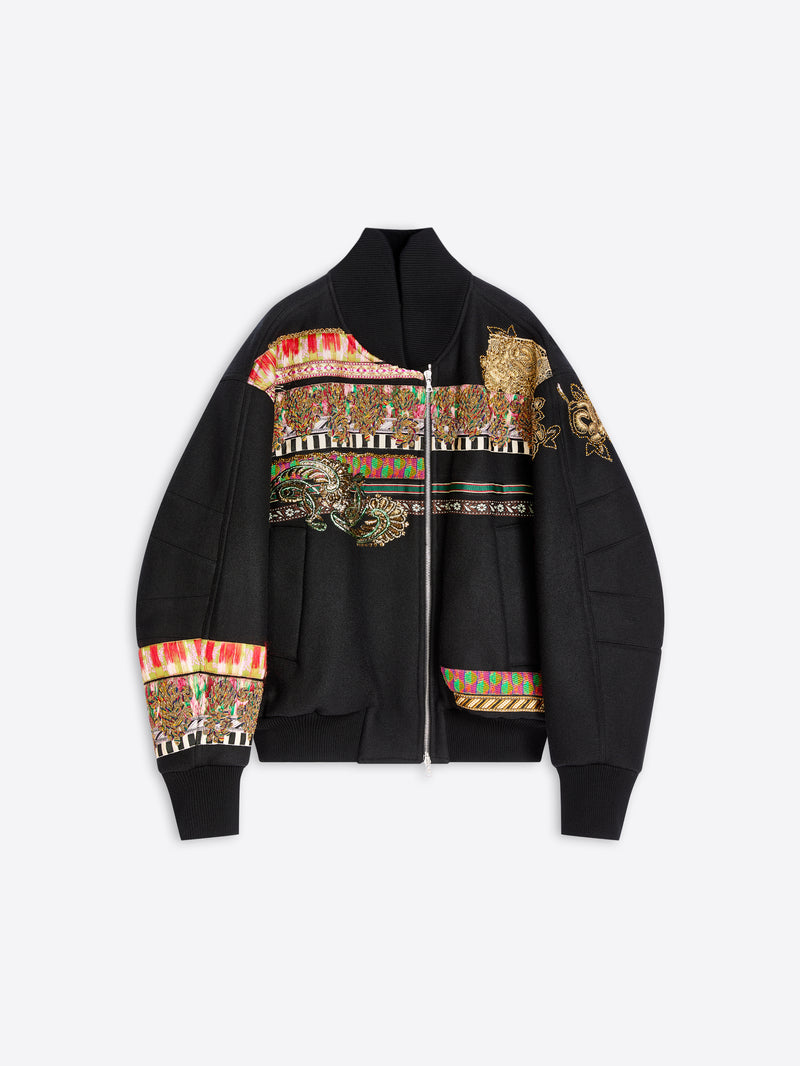 A black bomber jacket featuring intricate multicolor embroidered patterns across the chest, shoulders, and cuffs, displayed on a light gray background.