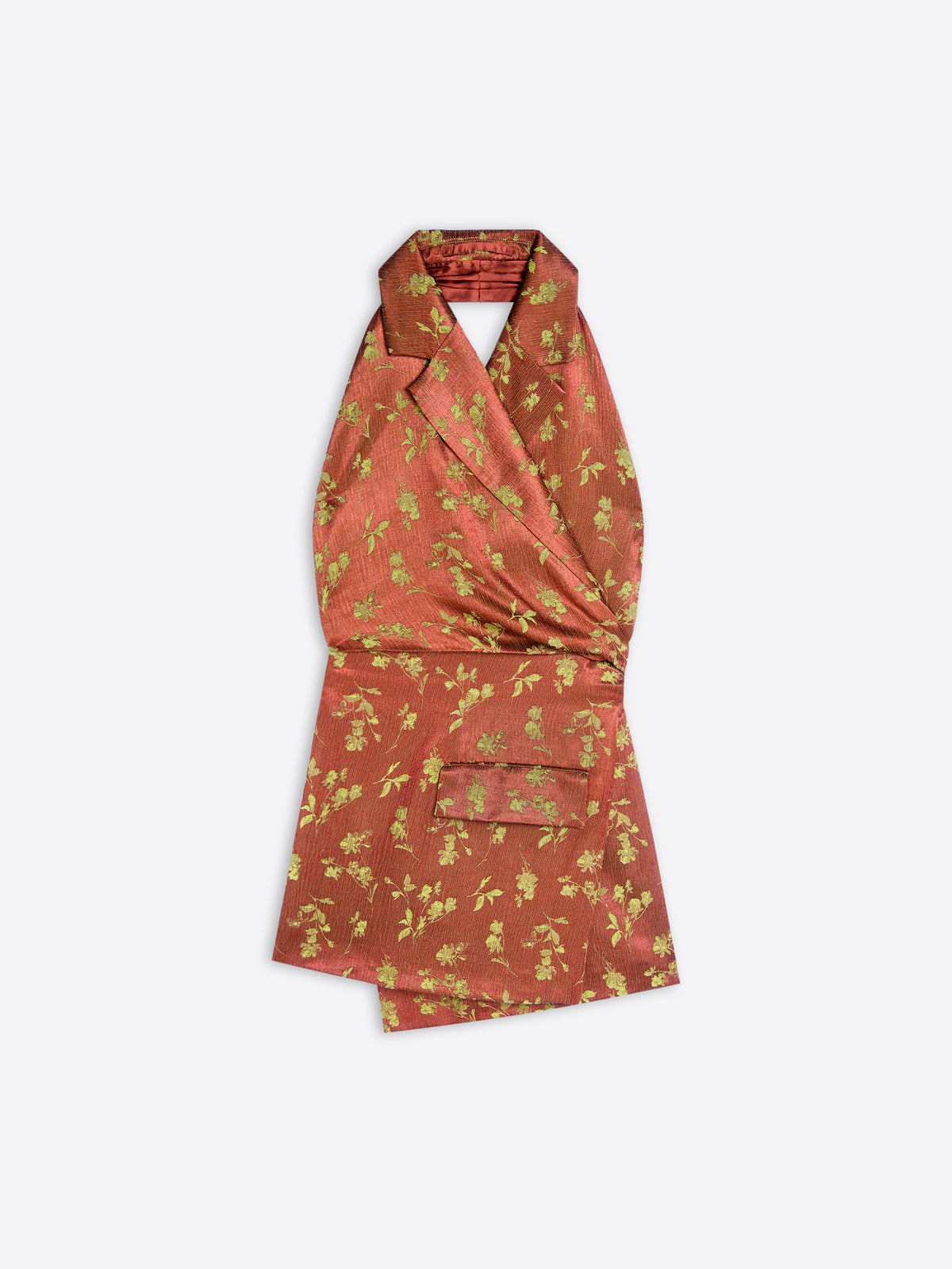 A halter-neck wrap top in rust-orange with a floral pattern, featuring a wrap-style collar and a front pocket, shown flat on a light gray background.