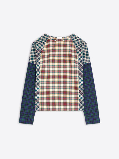 A long-sleeve raglan top with a multi-colored plaid pattern, featuring a cream and red checkered center body, green and white checkered shoulder yokes, and solid dark green plaid sleeves, shown flat on a light gray background.