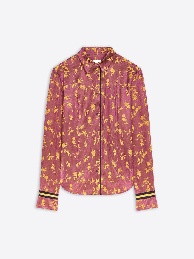 A long-sleeve button-up shirt in a dusty rose pink color with a yellow floral pattern, featuring yellow stripes on the cuffs.