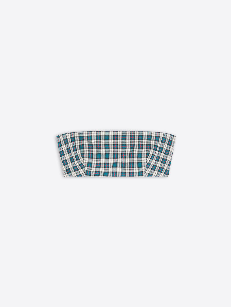 A cropped, strapless top featuring a green and white plaid pattern, displayed flat against a light gray background.