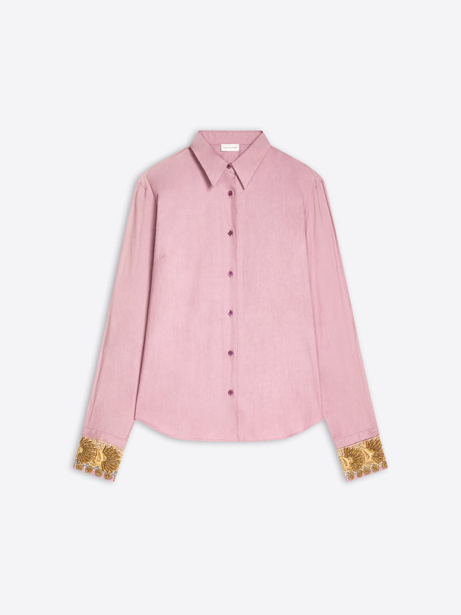 A light pink long-sleeve button-up shirt with gold lace cuff details, displayed flat against a light gray background.