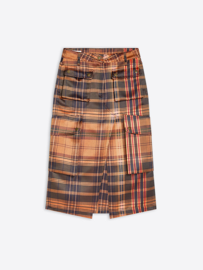 A plaid wrap skirt in orange, brown, and black on a light gray background. 
