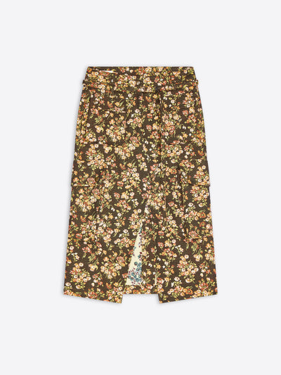 A dark olive green midi skirt with an all-over dense floral print in beige, cream, and light orange, featuring a side slit.