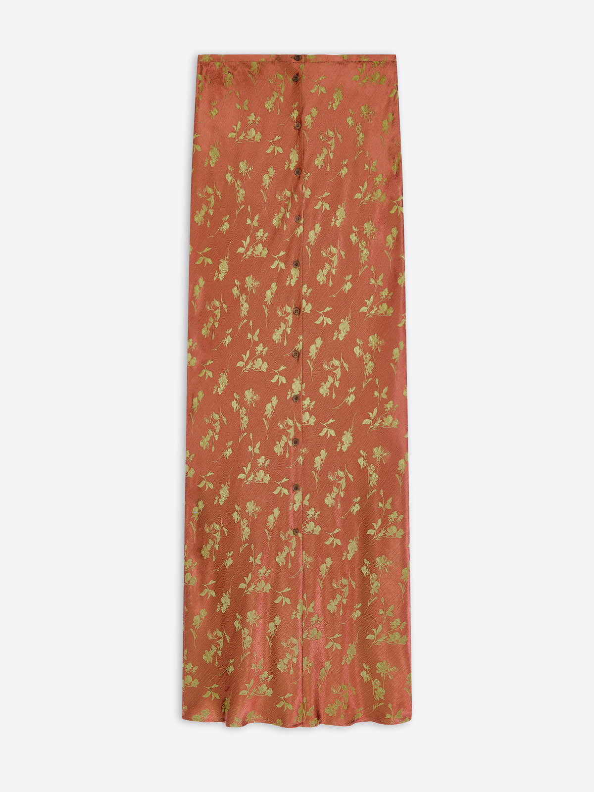 A rust-orange maxi skirt with a gold floral and leafy pattern, shown flat against a light gray background.