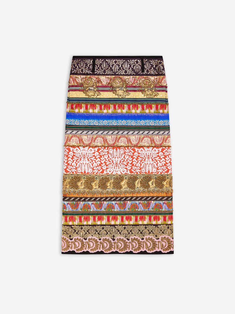 A long skirt with an intricate horizontal striped pattern featuring various motifs displayed flat against a light gray background.