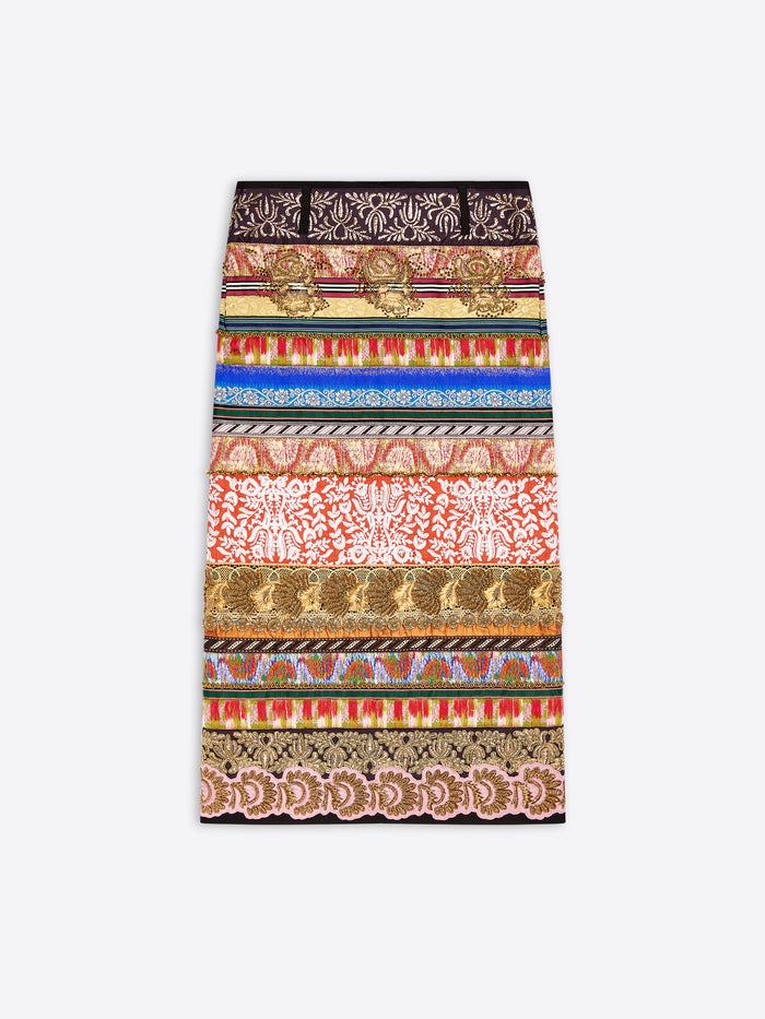 A long skirt with an intricate horizontal striped pattern featuring various motifs displayed flat against a light gray background.