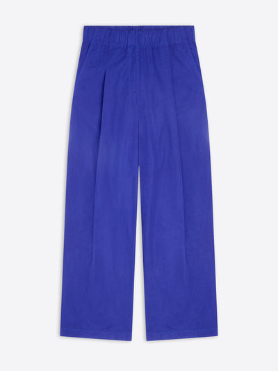 A pair of wide-leg trousers in a vibrant royal blue color, shown flat against a light gray background.