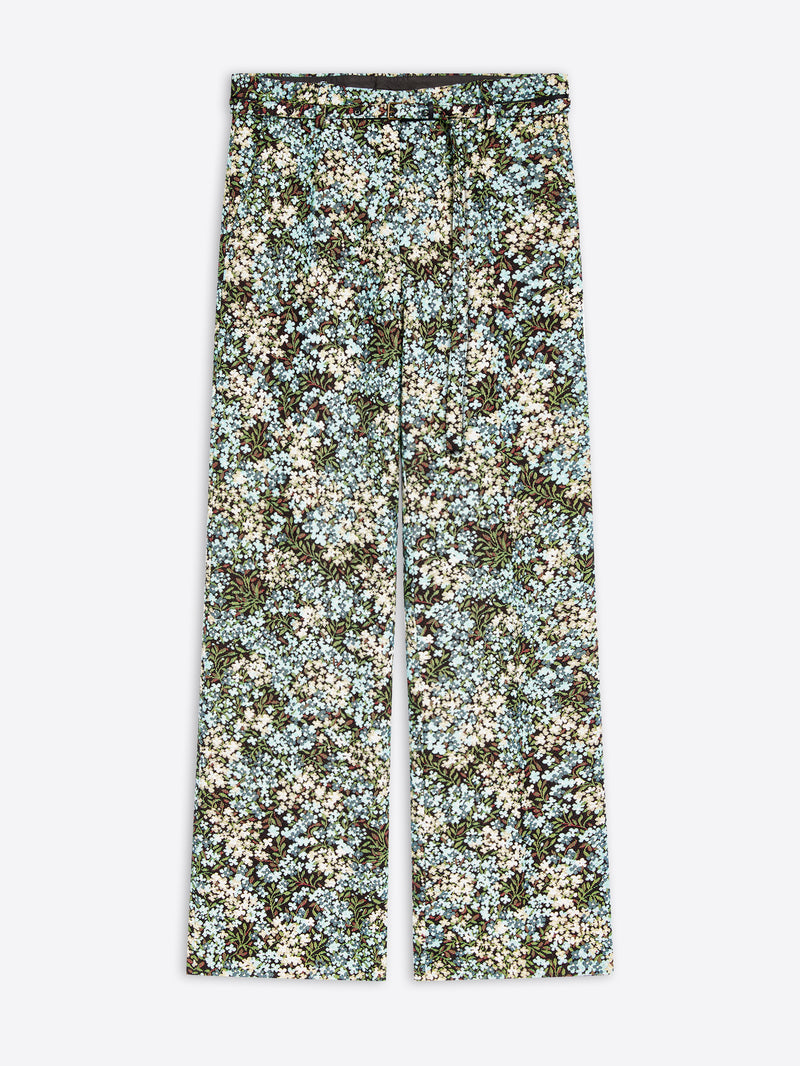 Wide-leg pants featuring an all-over dense floral print on a light gray background 