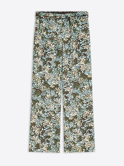 Wide-leg pants featuring an all-over dense floral print on a light gray background 