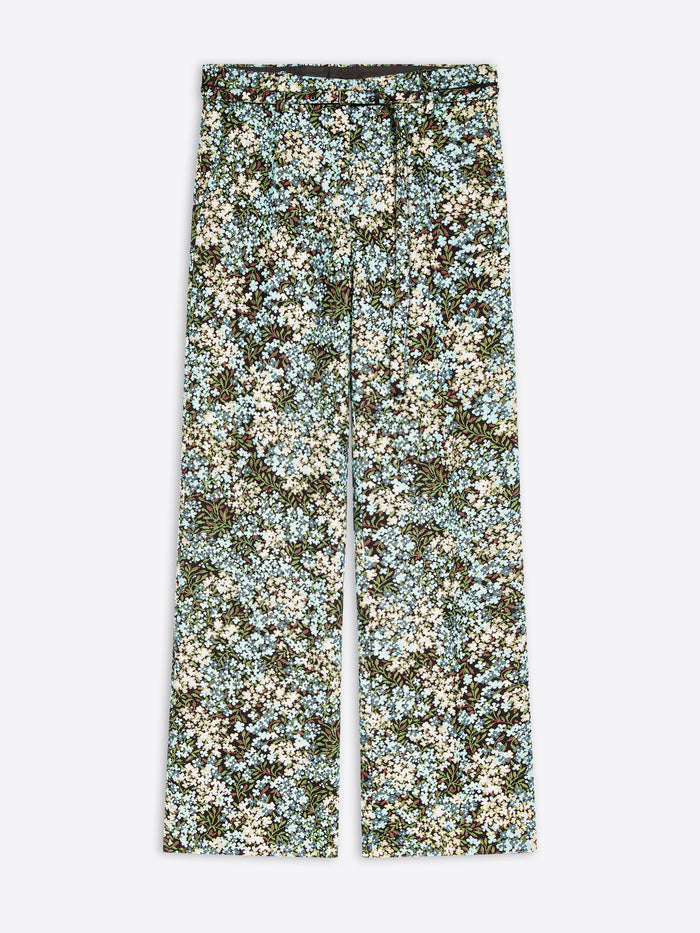 Wide-leg pants featuring an all-over dense floral print on a light gray background 