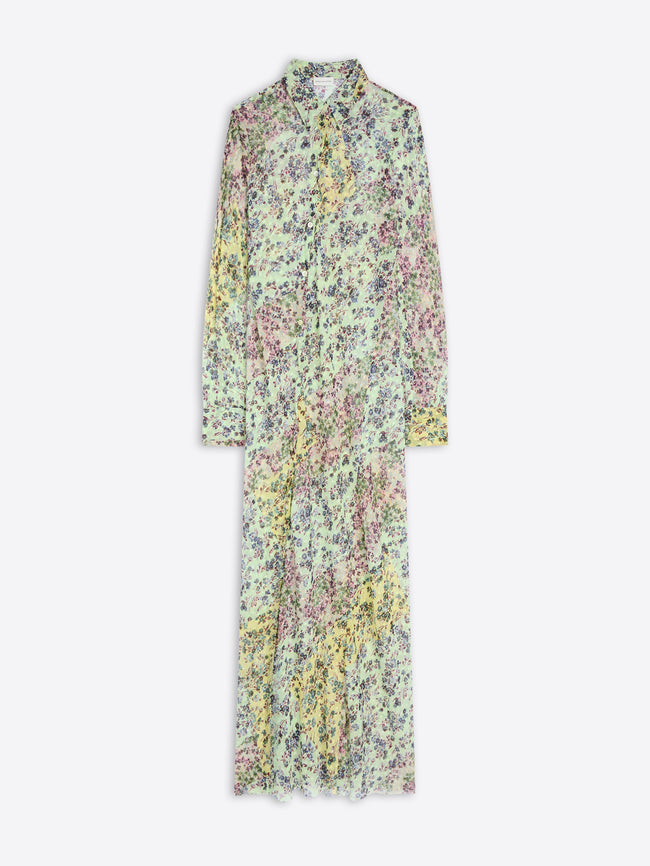 A long-sleeve collared maxi shirt dress with an all-over dense floral print in pastel yellow, pink, green, and blue on a light background, shown flat against a light gray background.